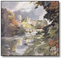 a stream with a ruined castle in the background 